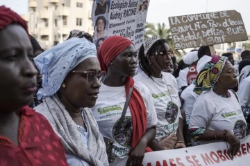 Senegalese women take aim at polluting countries in march for climate justice